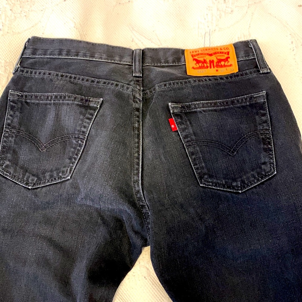 Levi’s 514 black faded wide crop jeans